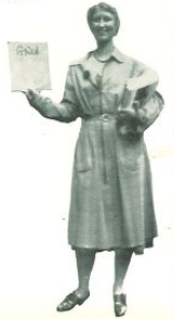 Prompt B. A smiling woman clutches a handful of publications in her left arm while showcasing the publication with her right hand.